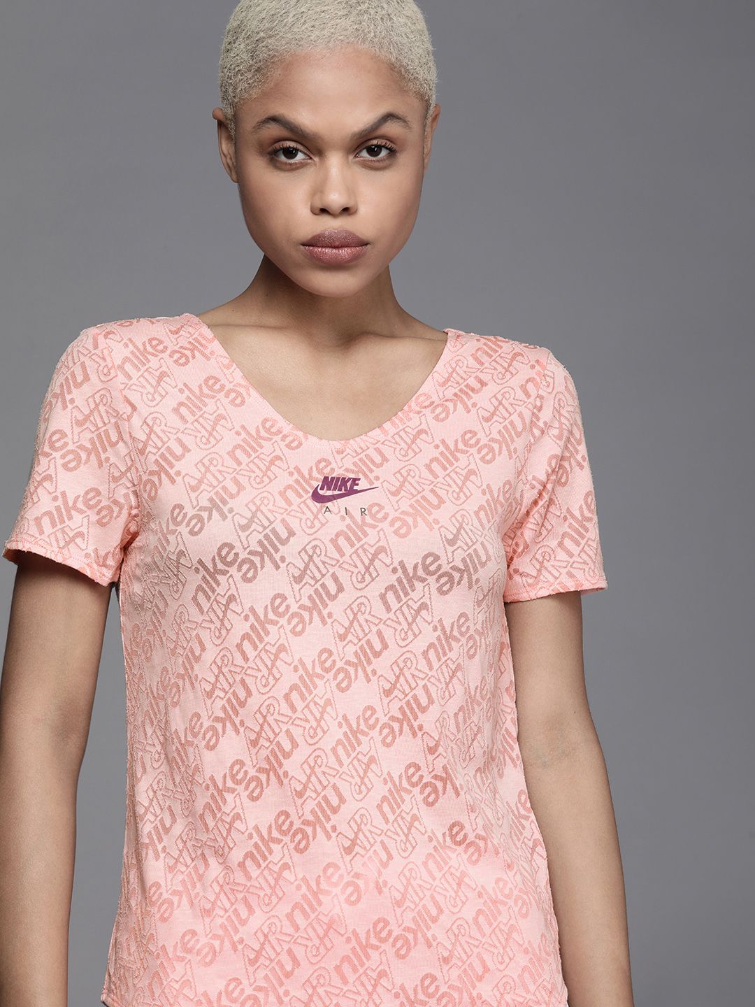 Nike Women Pink Self-Design Dri-FIT Running Top Price in India