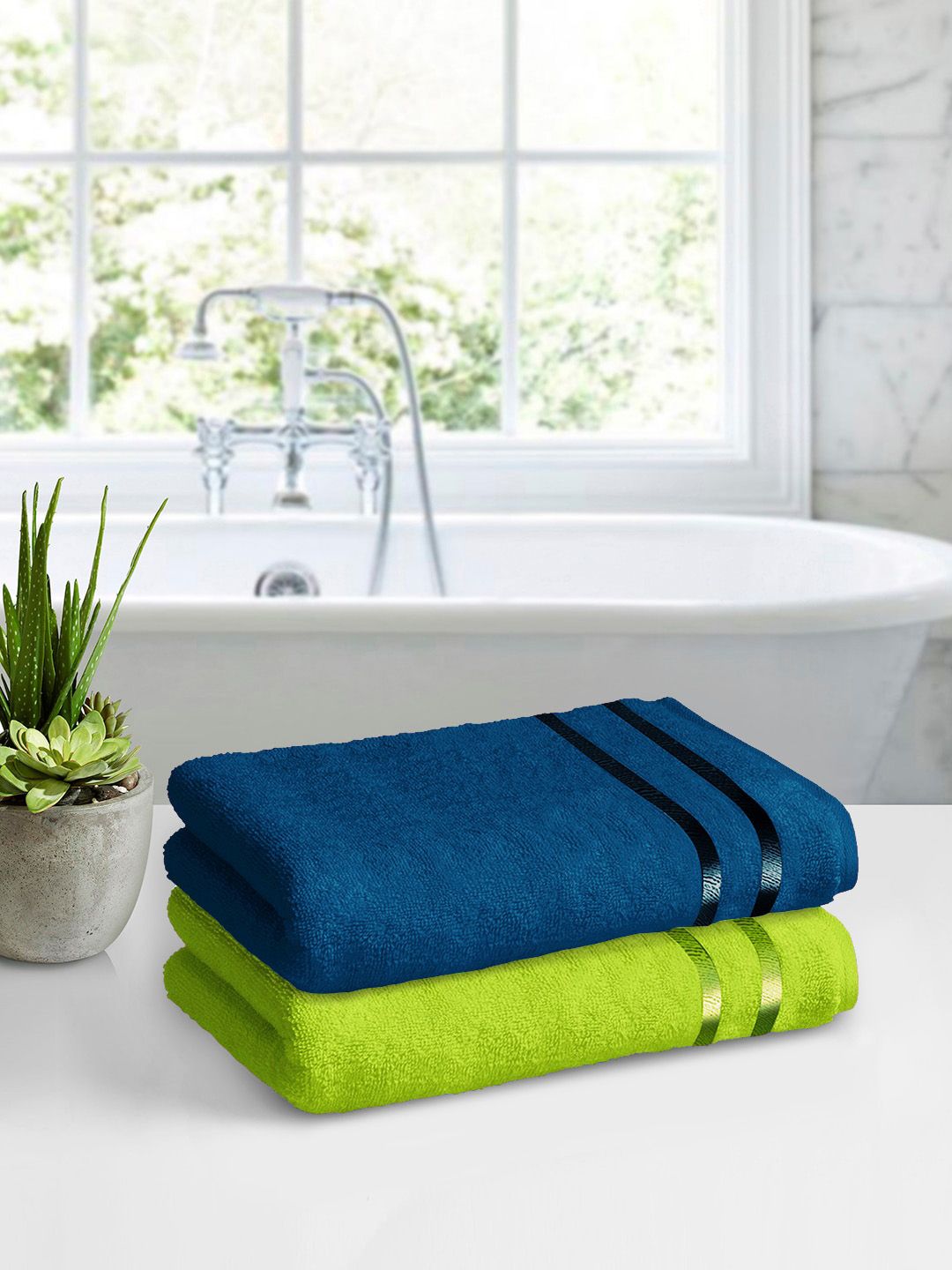 Story@home Unisex Green and Navy Blue Set of 2 Solid Bath Towels Price in India