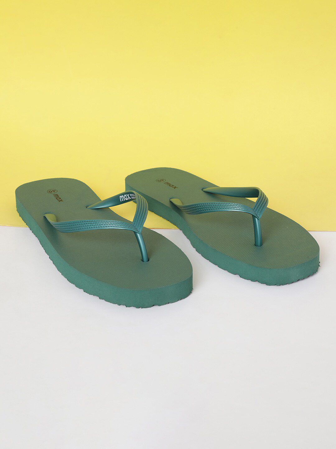 max Women Green Rubber Thong Flip-Flops Price in India