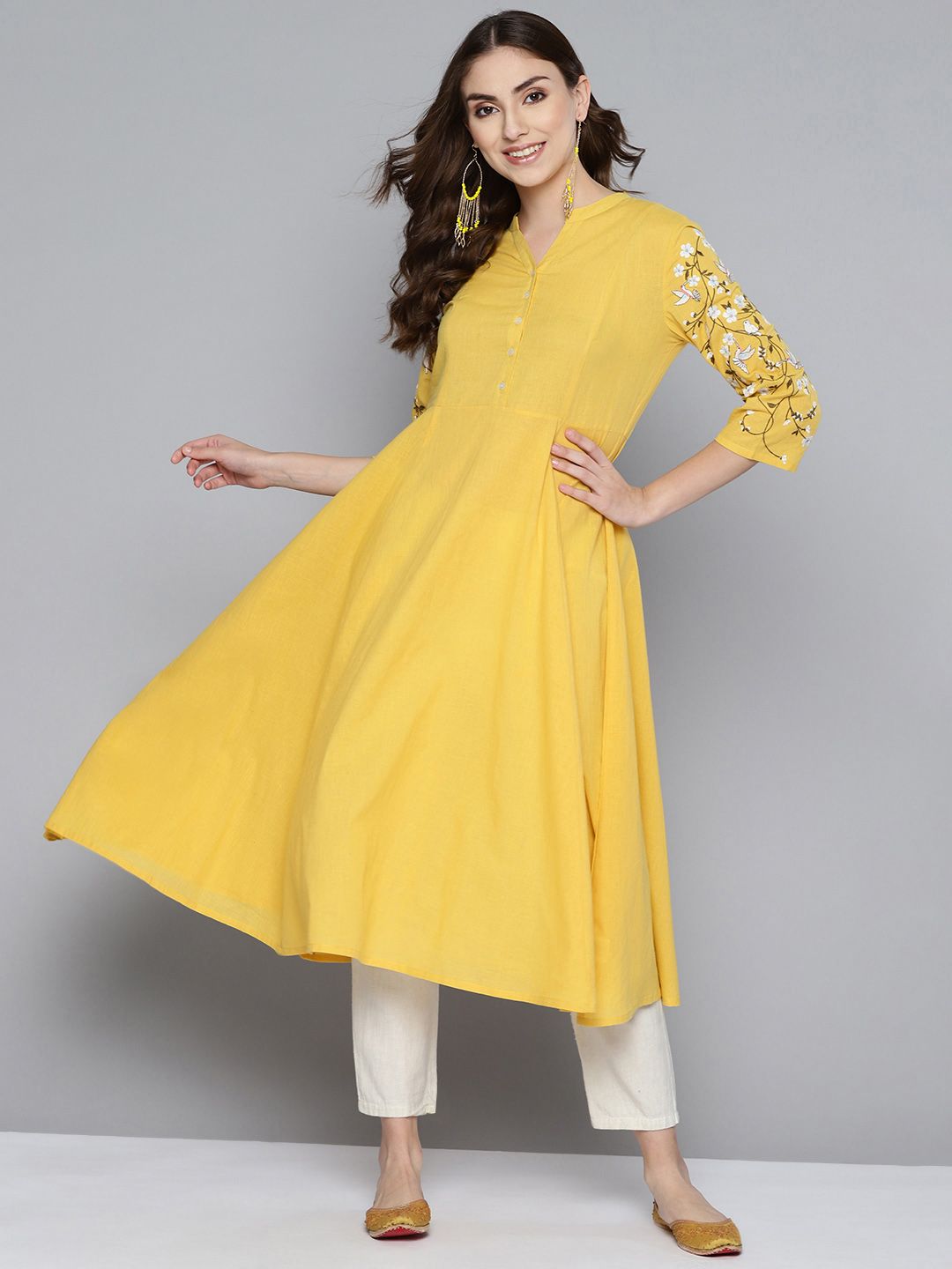 HERE&NOW Women Yellow Solid Floral Embroidery A-line Kurta