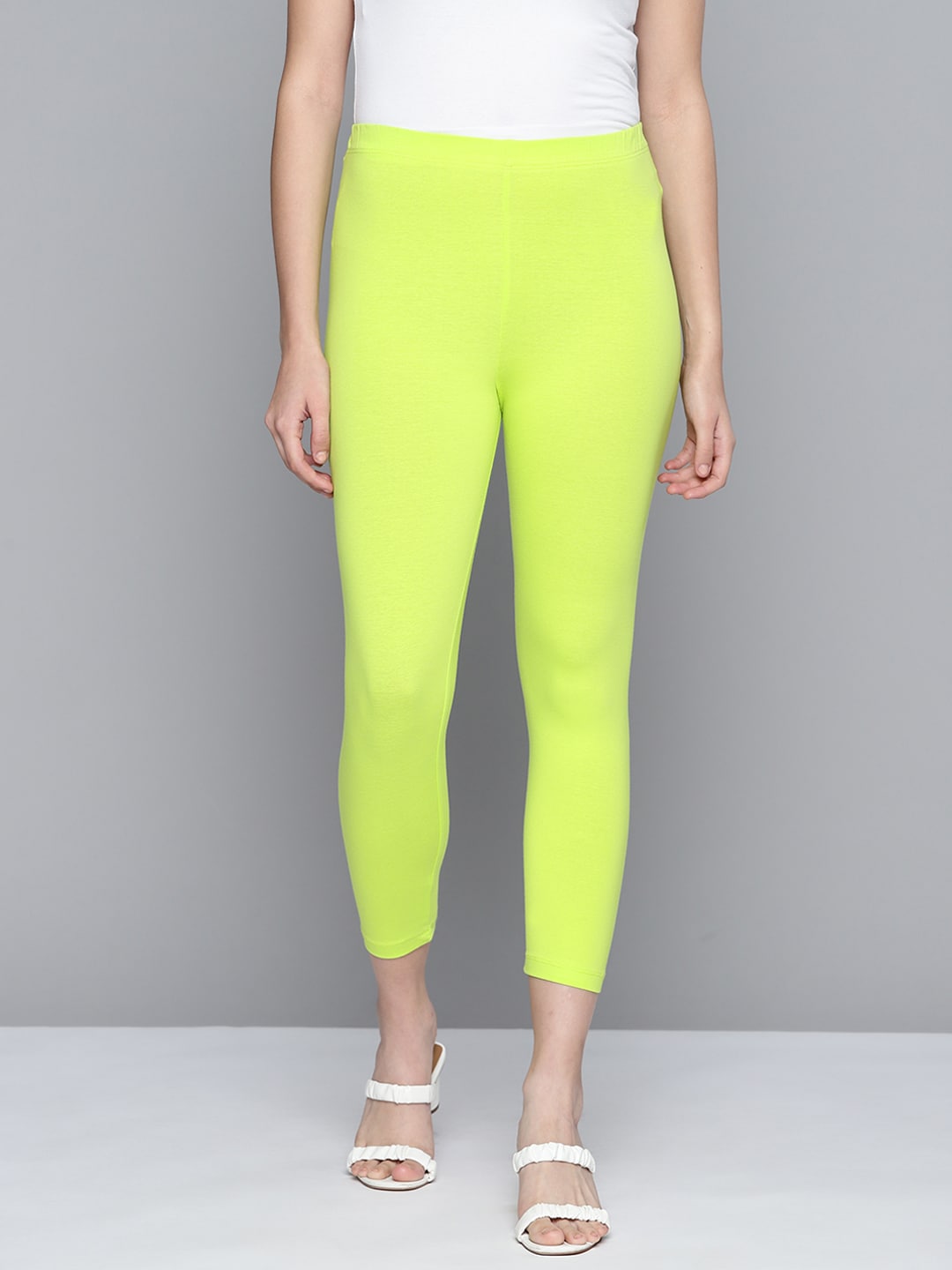 HERE&NOW Women Fluorescent Green Solid Three-Fourth Length Leggings Price in India