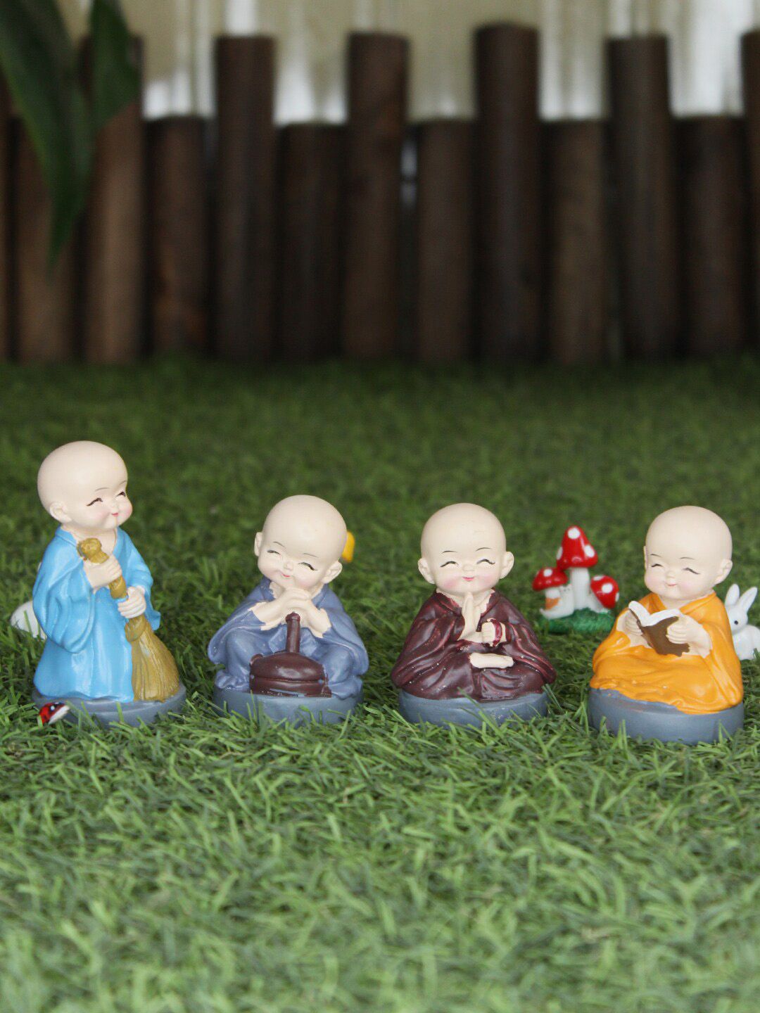 Wonderland Set of 4 Blue Small Monks Miniature toys Price in India