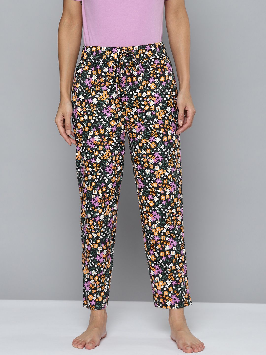 HERE&NOW Women Black & Orange Floral Print Pure Cotton Lounge Pants Price in India
