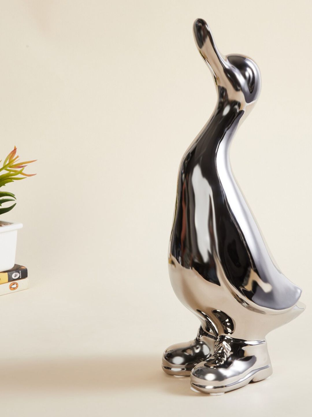 Home Centre Silver-Toned Brighton Solid Ceramic Duck Showpiece Price in India