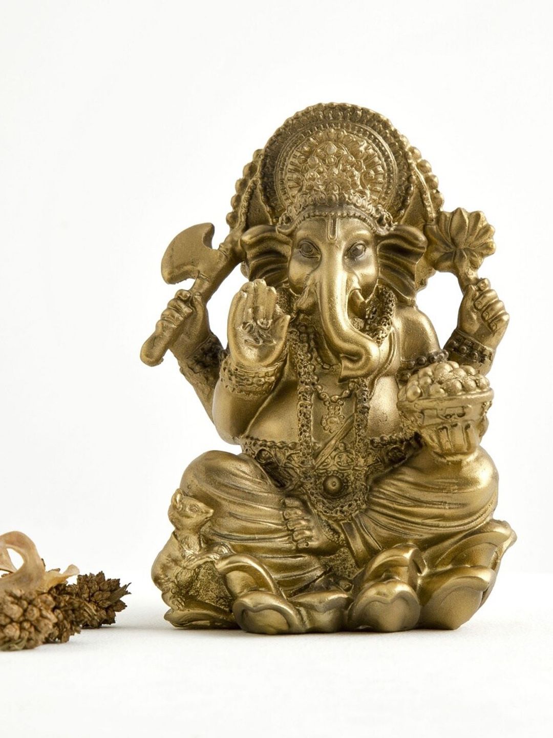 Home Centre Gold-Toned Ganesha Figurine Showpiece Price in India