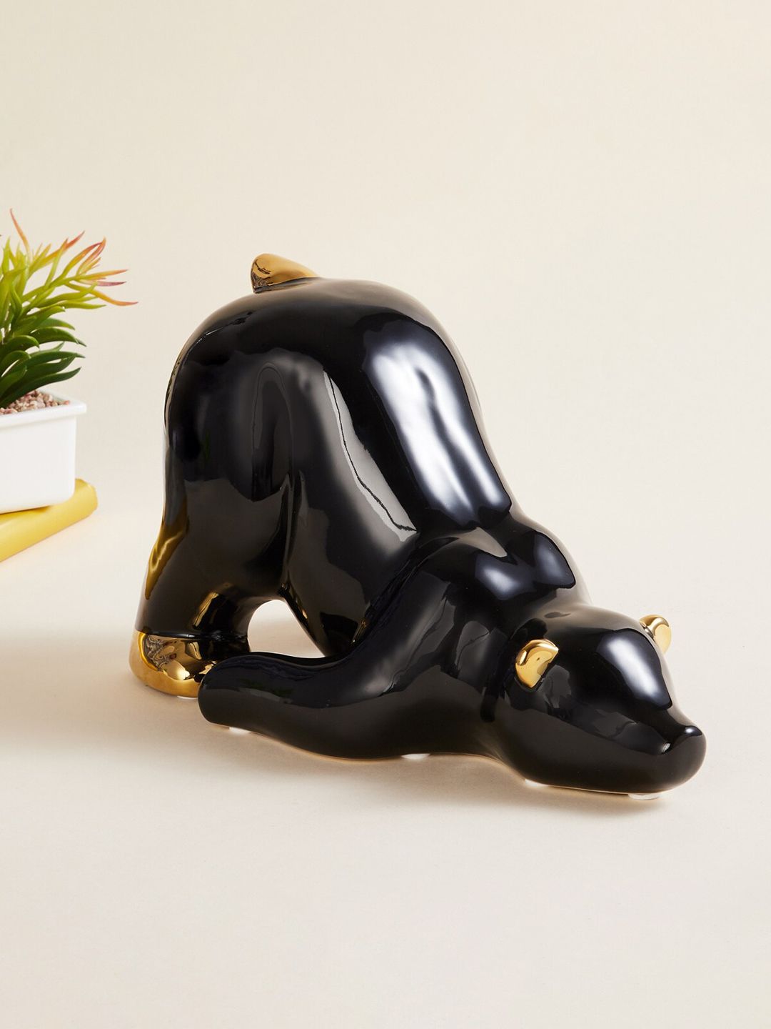 Home Centre Balck And Gold Solid Ceramic Bear Figurine Price in India