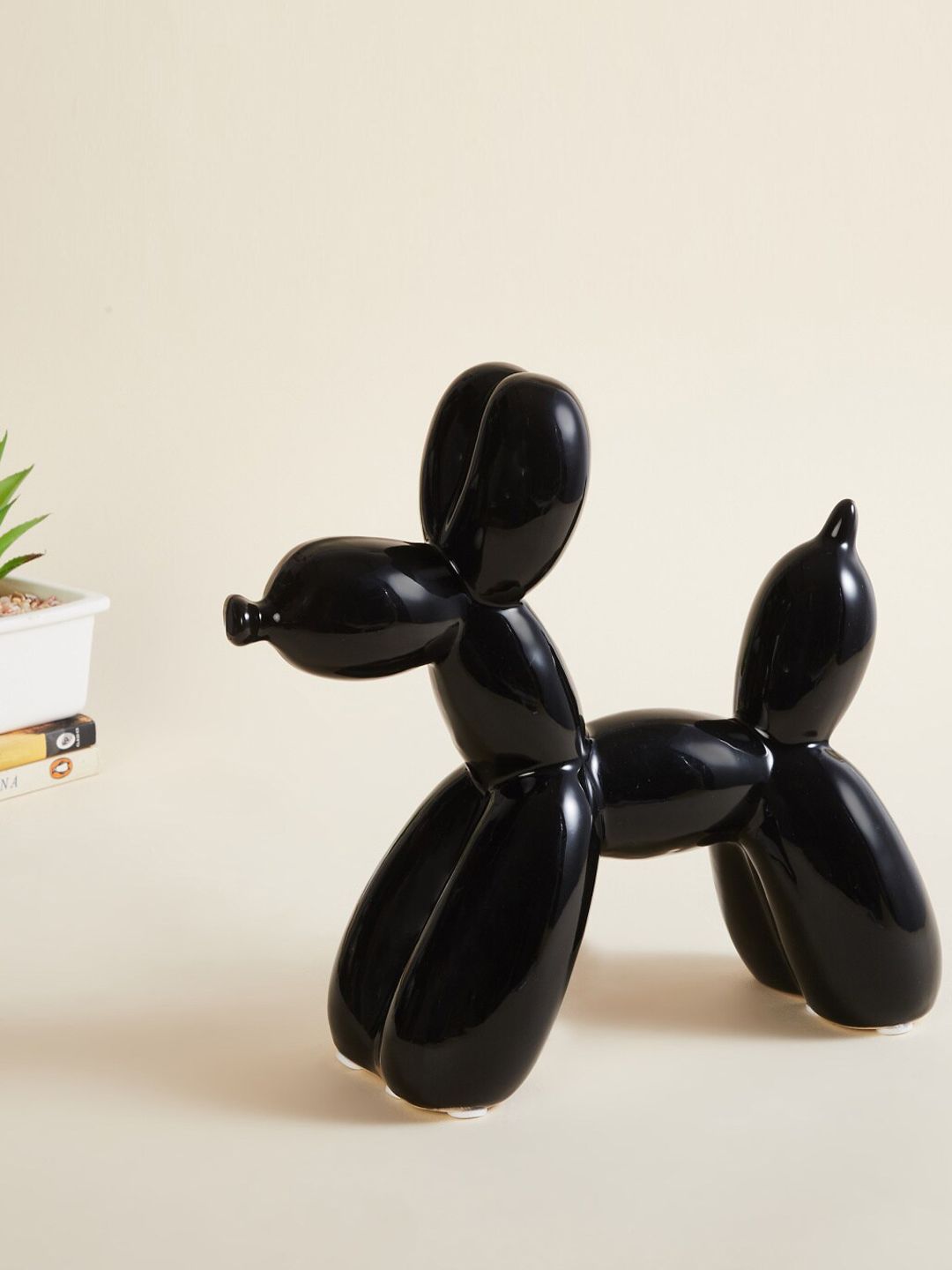 Home Centre Black Solid Dog Showpiece Price in India