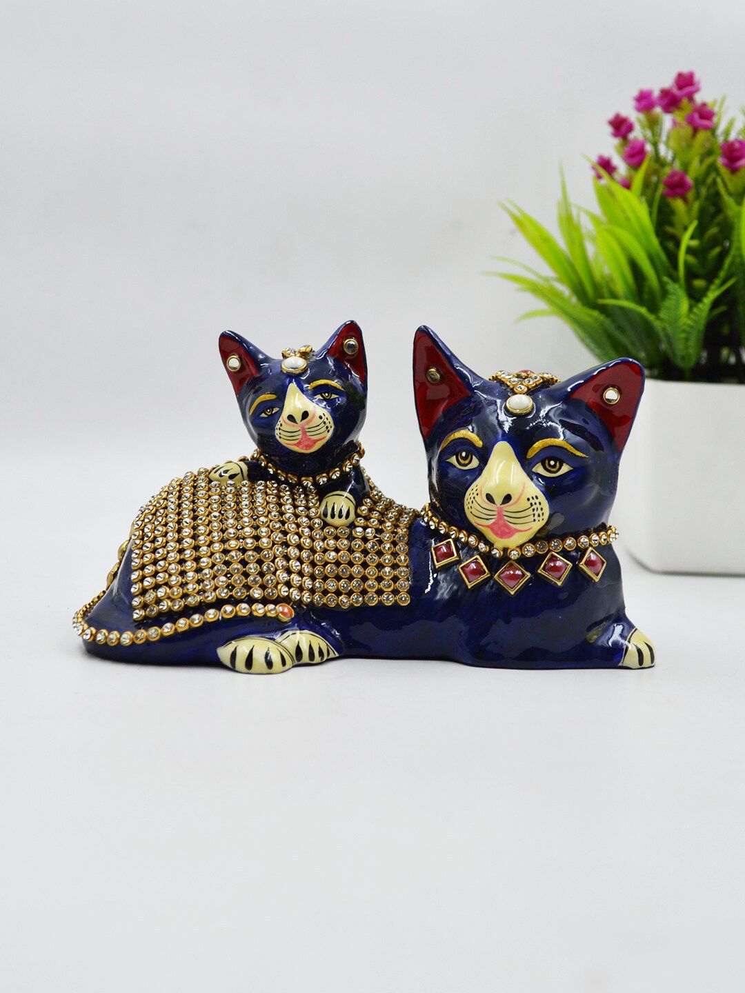 CraftVatika Blue & Metallic-Toned Textured Kitty Cat Showpiece Price in India