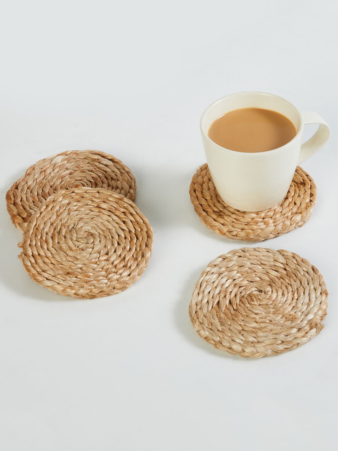 Home Centre Brown Set Of 4 Textured Jute Round Coaster Price in India