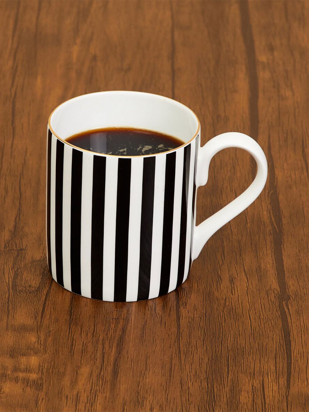 Home Centre White & Black Printed Bone China Glossy Mug Price in India