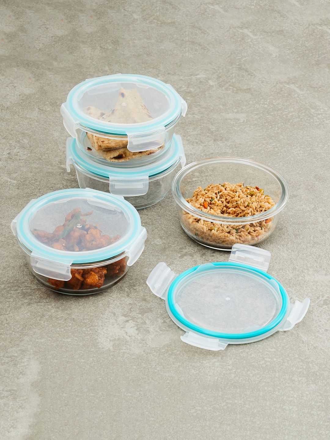 Home Centre Set Of 4 Transparent  & Blue Glass Storage Containers Price in India