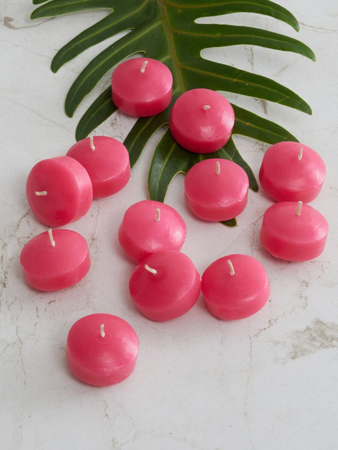 Home Centre Set of 12 Pink Floating Nuggets T-Light Candles Price in India