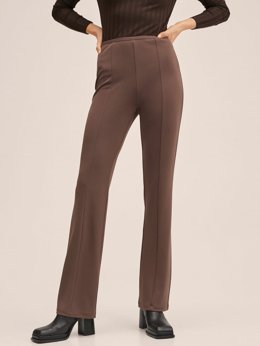 MANGO Women Coffee Brown Solid Flared Trousers Price in India