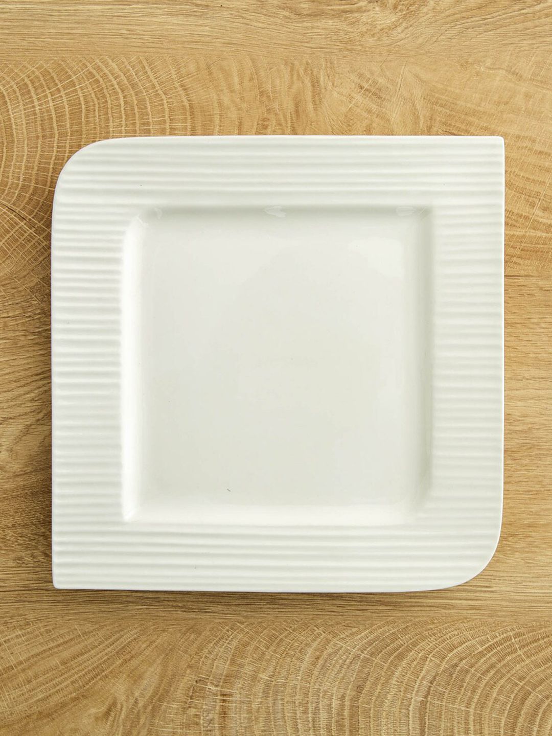 Home Centre White 1 Piece Porcelain Glossy Dinner Plate Price in India