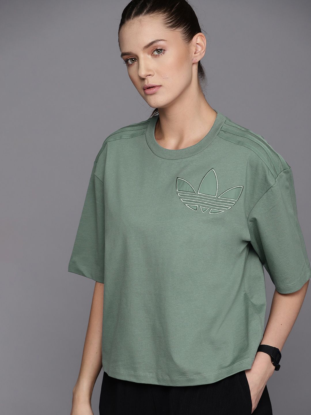 ADIDAS Originals Women Green Solid Pure Cotton Loose Trefoil Patch T-shirt Price in India