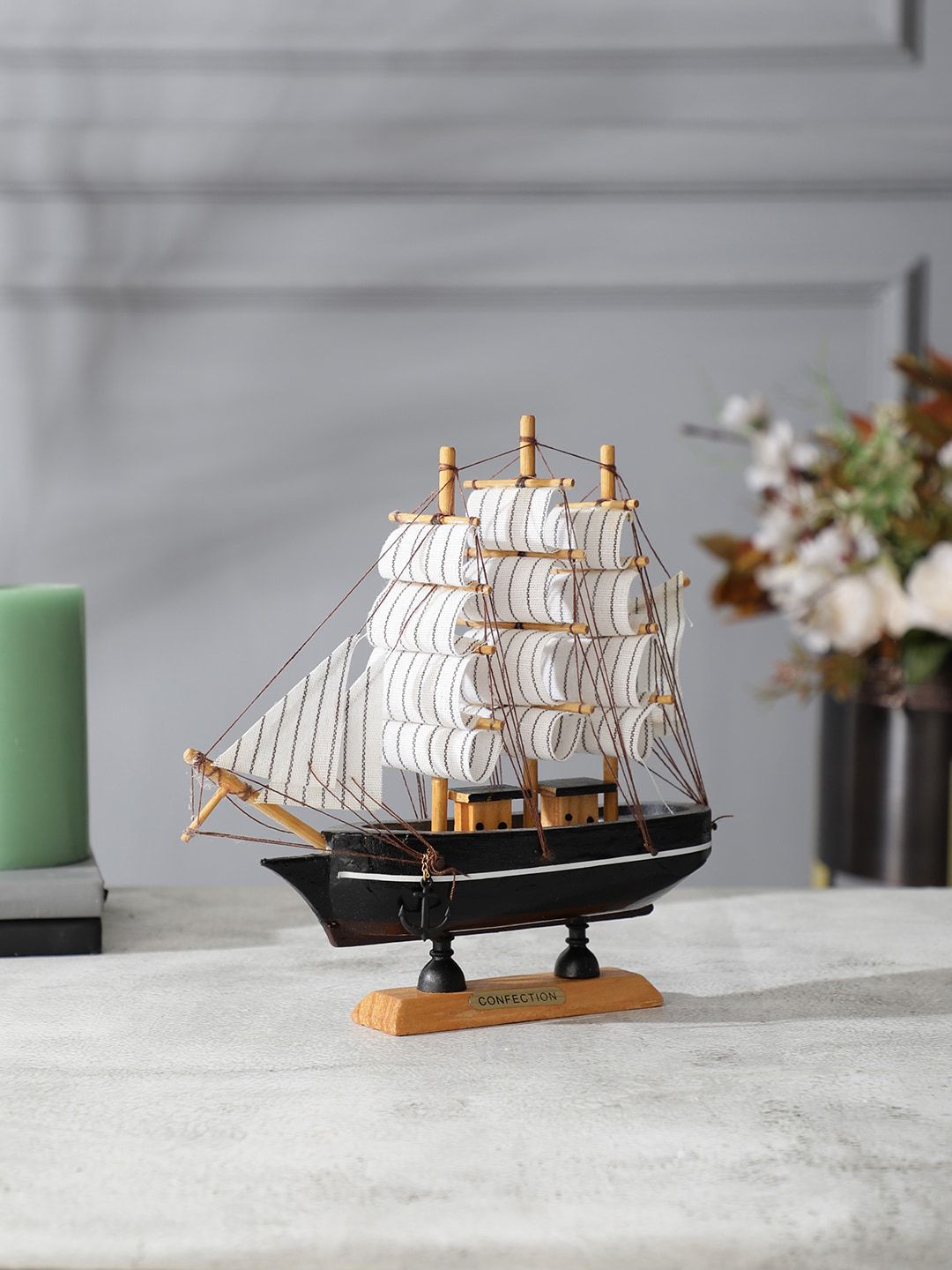 EXIM DECOR Black and Brown with White Stripes Sailing Ship Showpiece Price in India