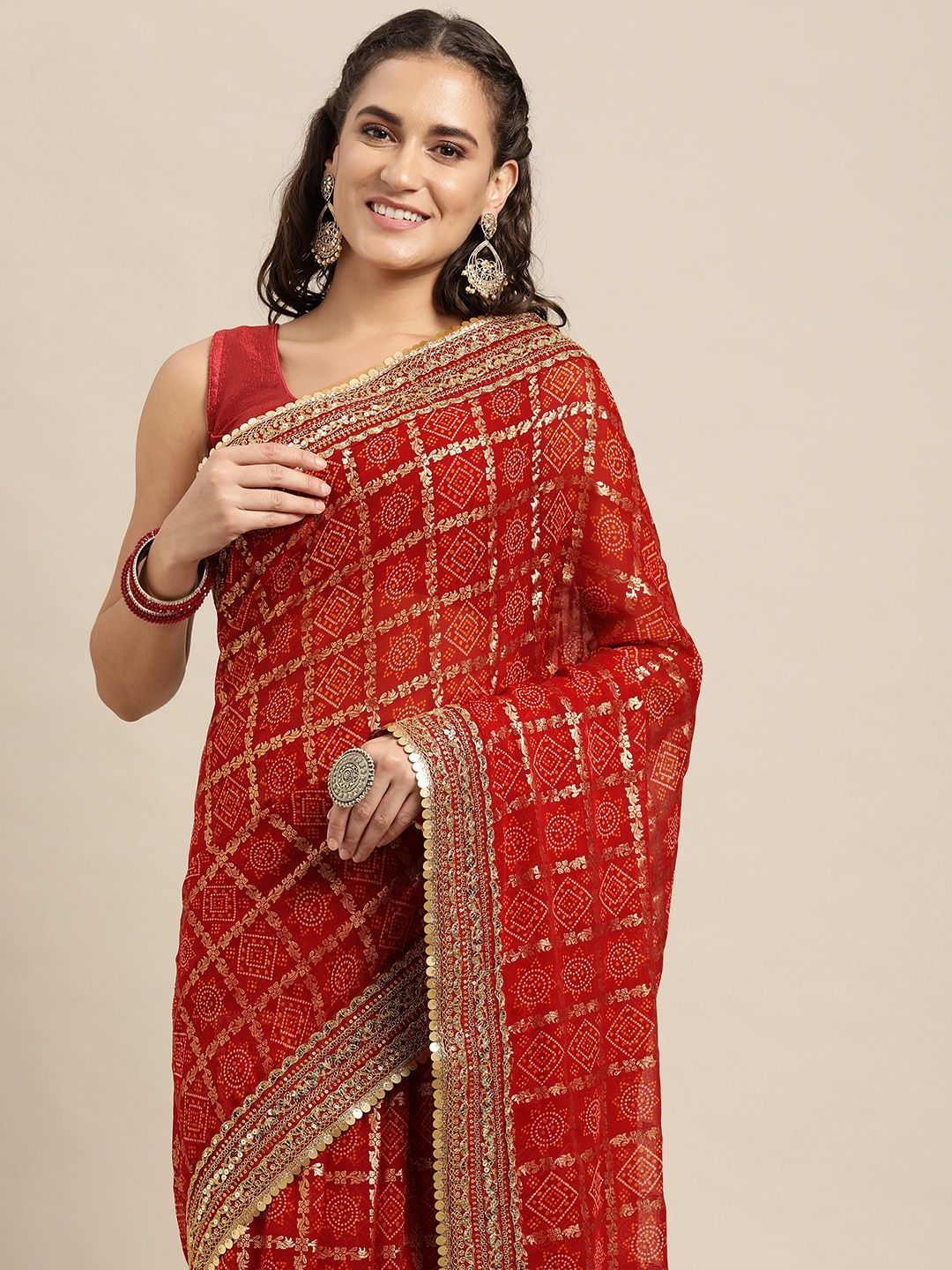 VASTRANAND Red & Golden Sequinned Bandhani Saree Price in India