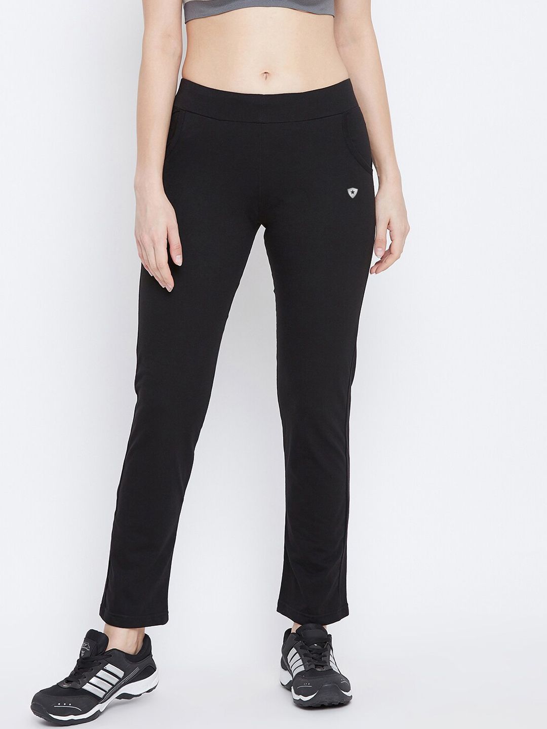 FRENCH FLEXIOUS Women Black Solid Slim-Fit Track Pants Price in India
