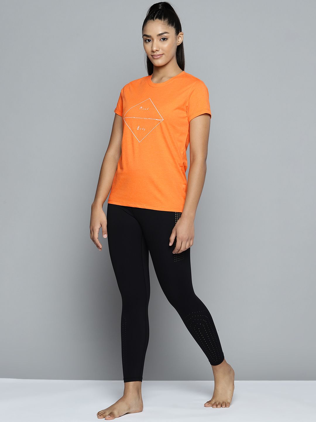 HRX by Hrithik Roshan Yoga Women Amber Melange Bio-Wash Typography Tshirts Price in India