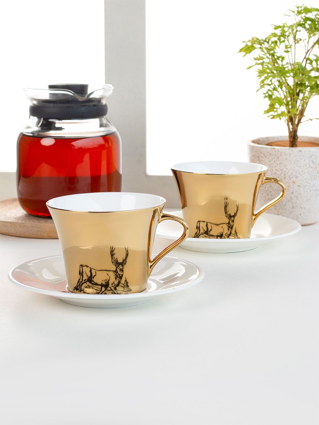 CLAY CRAFT Set Of 6 Gold-Toned & Black Printed Ceramic Glossy Cups and Saucers Set Price in India