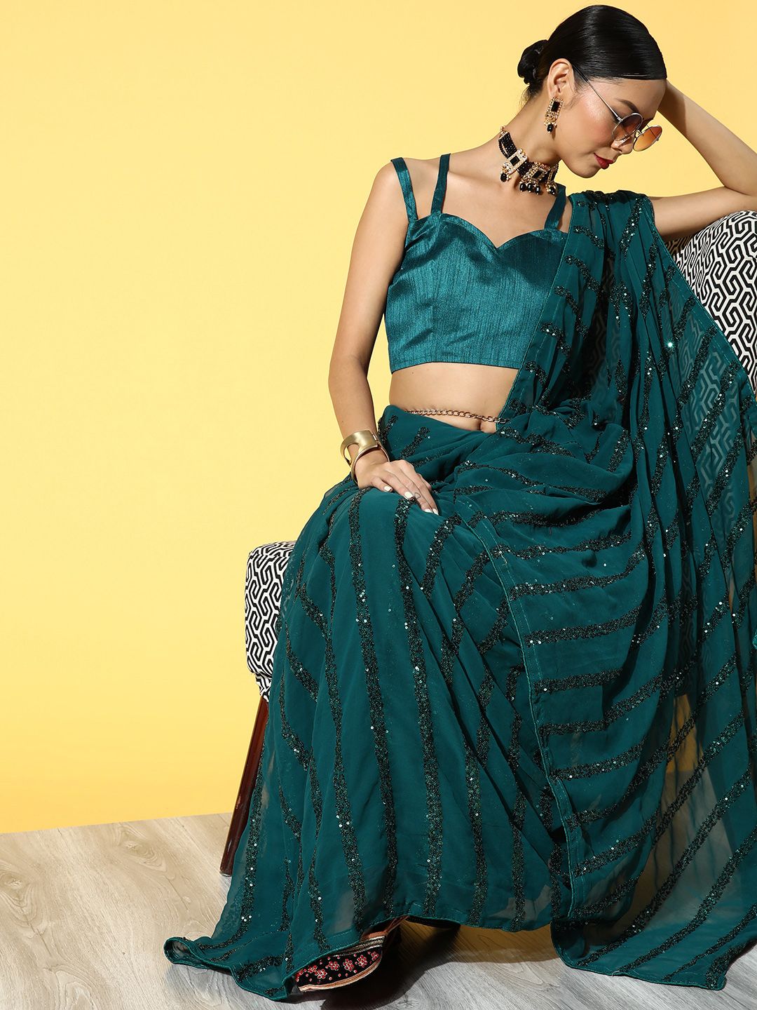 Mitera Green Embellished Sequinned Pure Georgette Saree Price in India