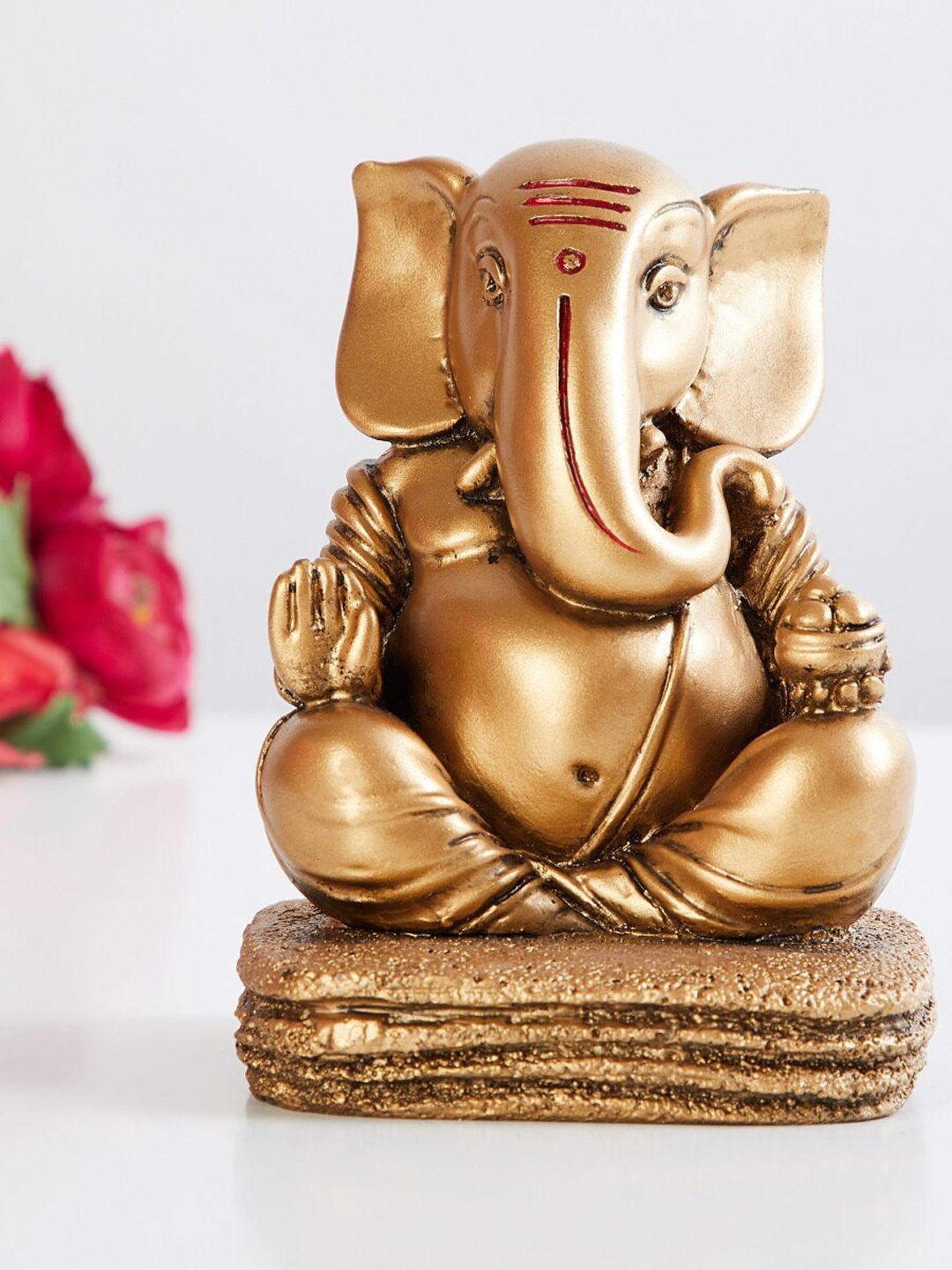 Home Centre Gold-Toned Textured Ganpati Showpiece Price in India