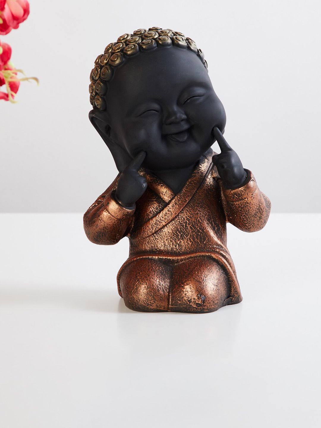 Home Centre Black & Copper-Toned Textured Polyresin Baby Buddha Figurine Showpiece Price in India