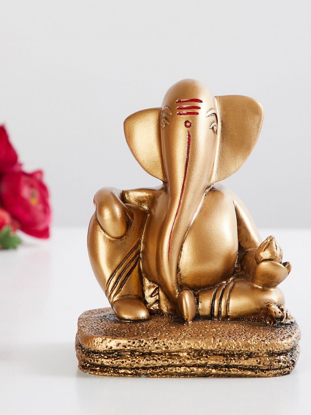 Home Centre Gold-Toned Textured Polyresin Ganpati Figurine Price in India