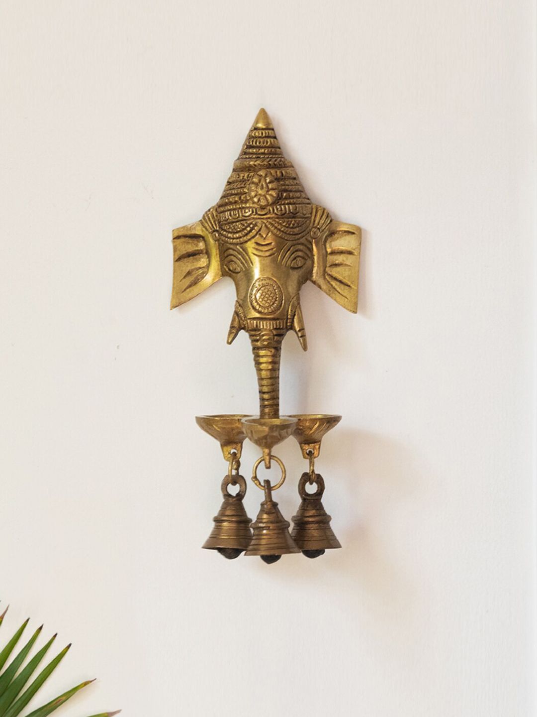 ExclusiveLane Gold-Toned Wall Hanging Diyas With Bells Price in India