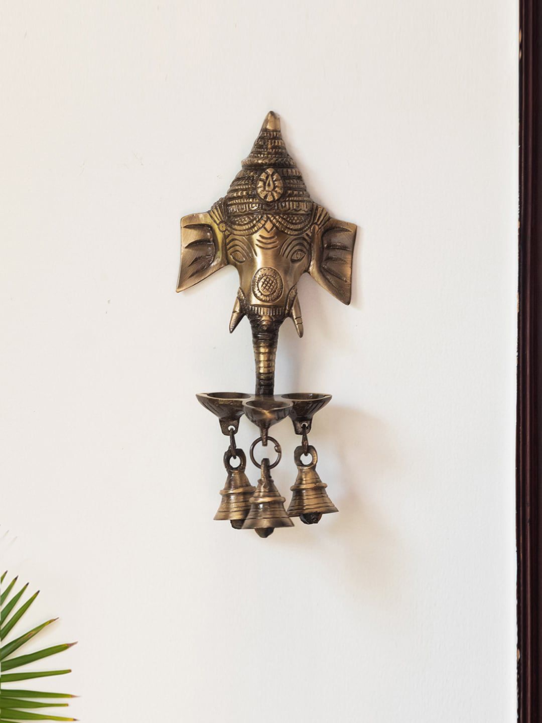 ExclusiveLane Gold Toned Gleeful Ganesha Hand-Etched Hanging Diyas With Bells Price in India