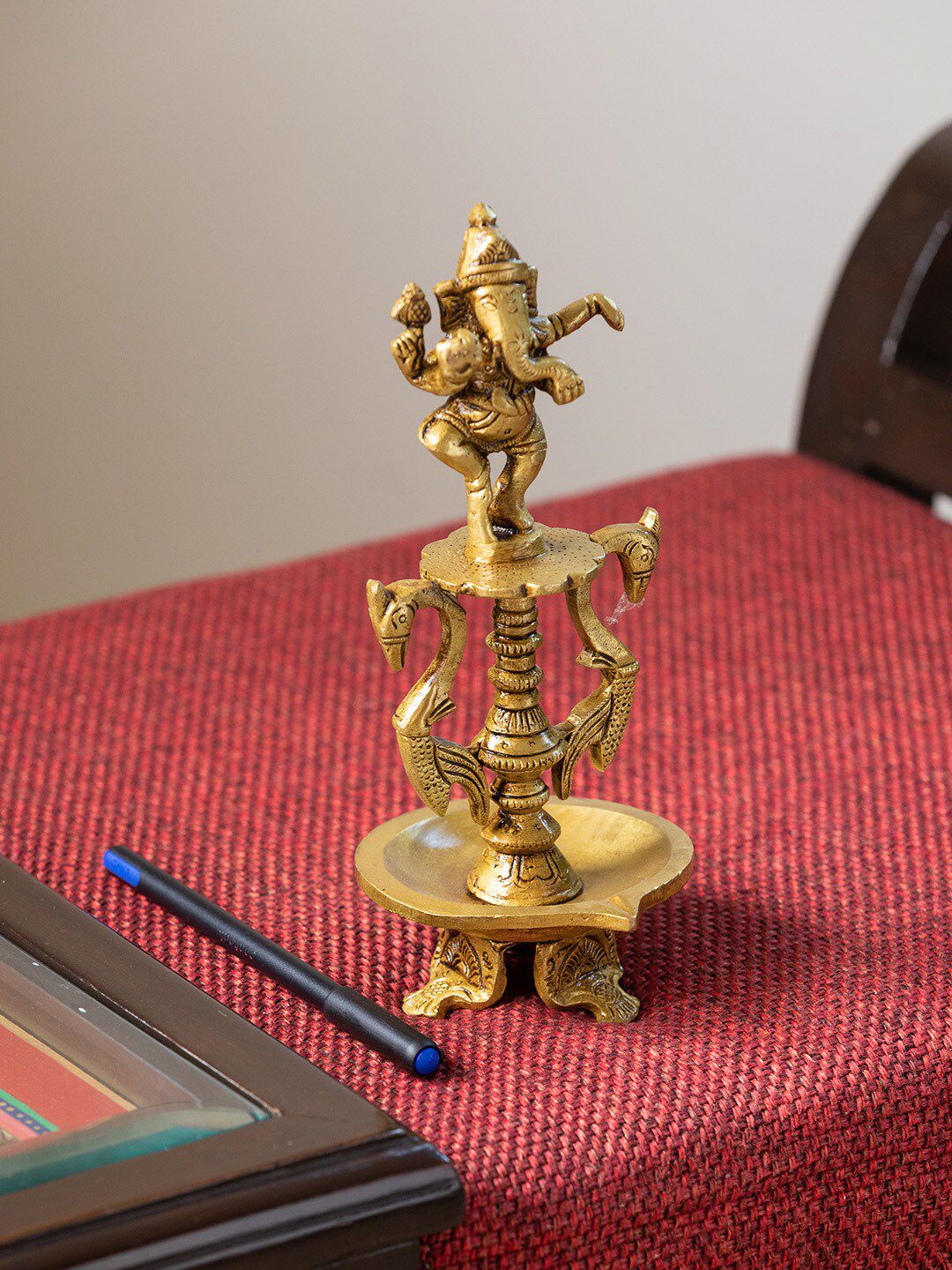 ExclusiveLane Gold-Toned Gallant Ganesha Idol Showpiece Price in India