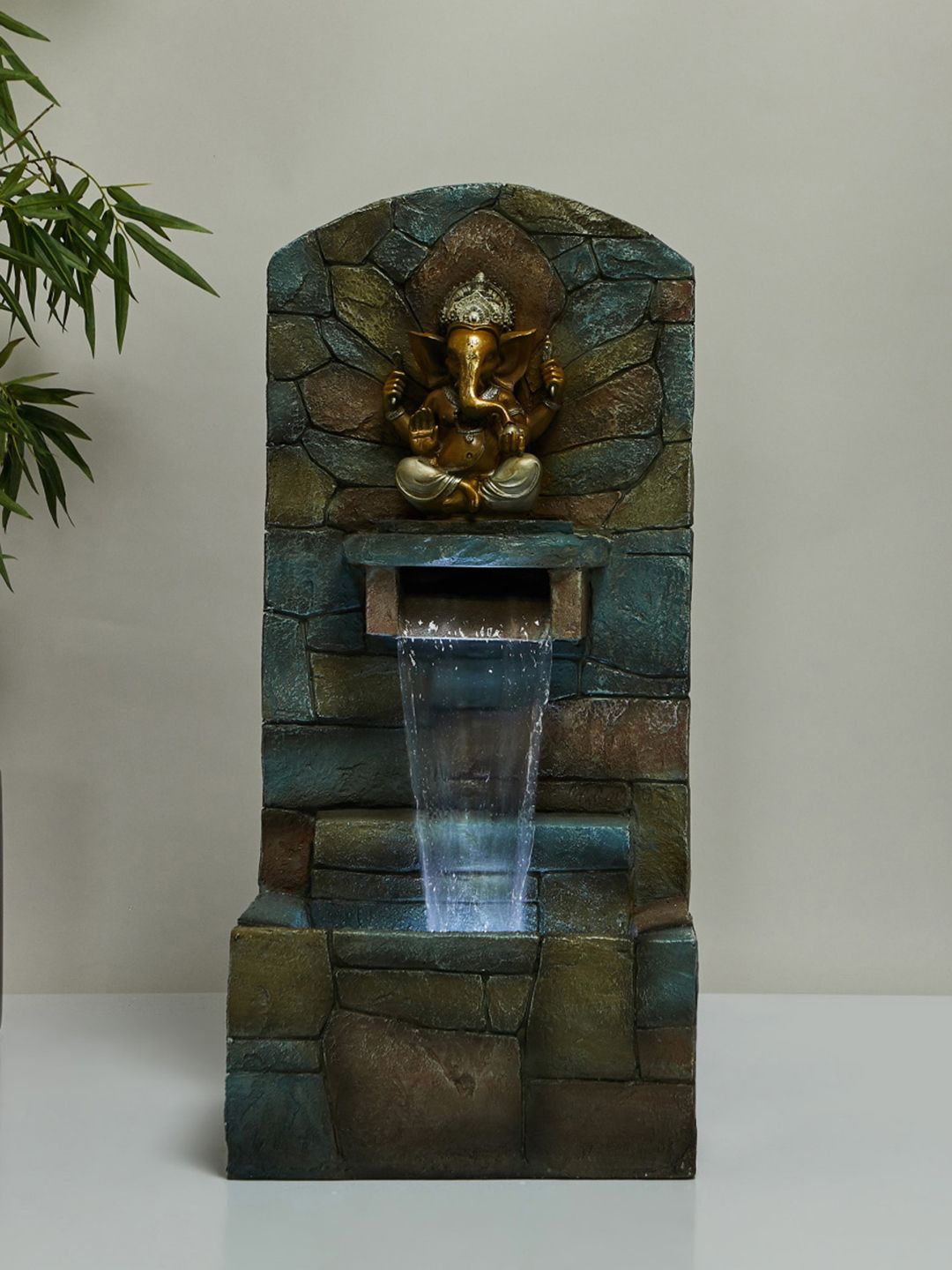 Home Centre Grey & Beige Textured Polyresin Electrical Ganesha Water Fountain Price in India