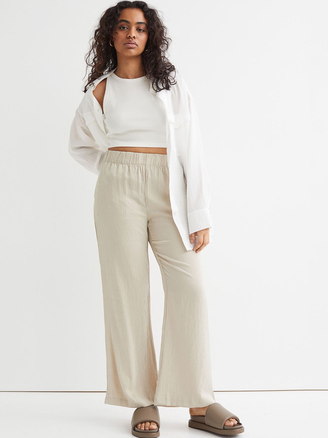 H&M Women Beige Solid Crinkled Trousers Price in India
