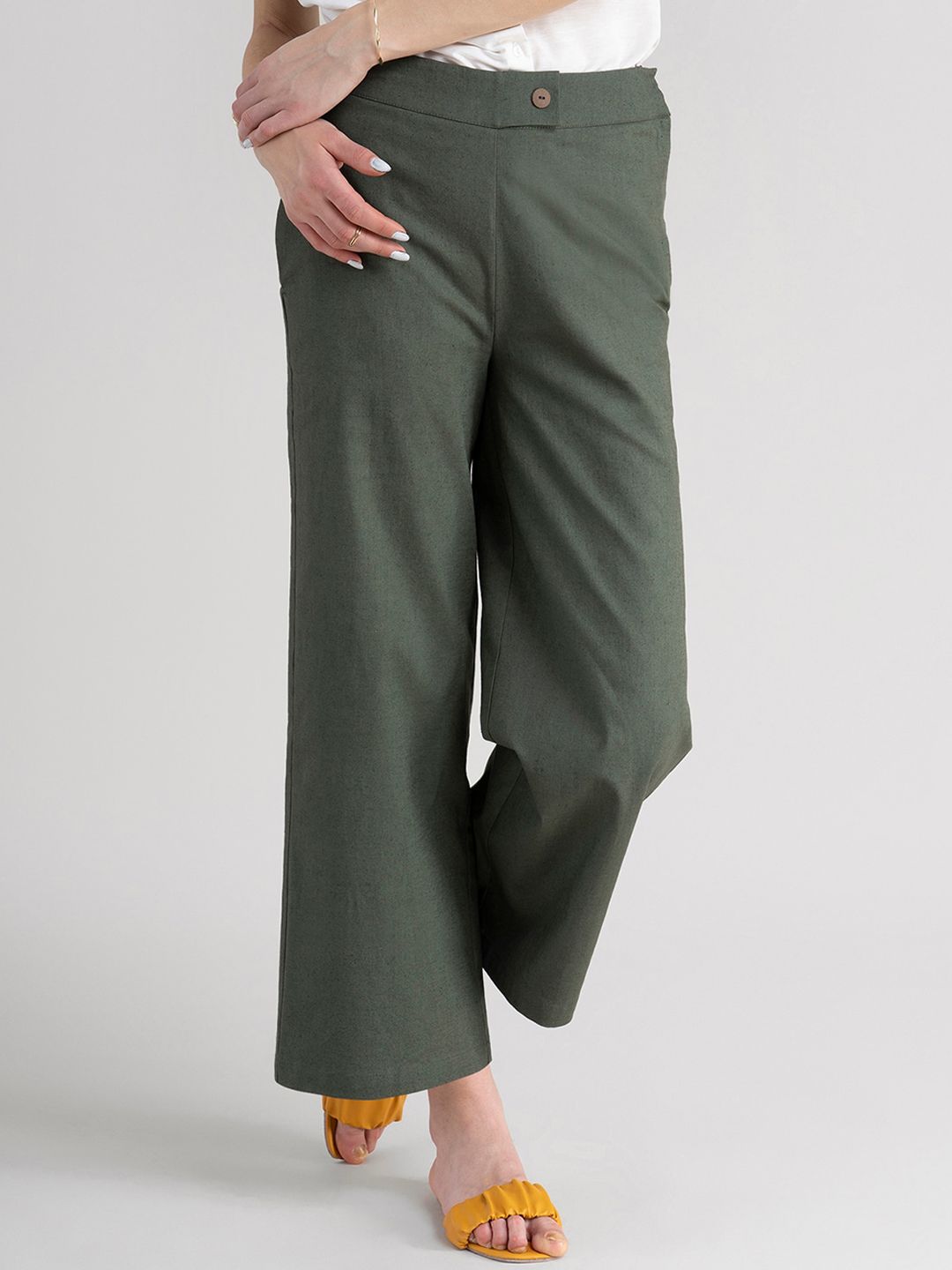 FableStreet Women Olive Green Comfort Flared Trousers Price in India