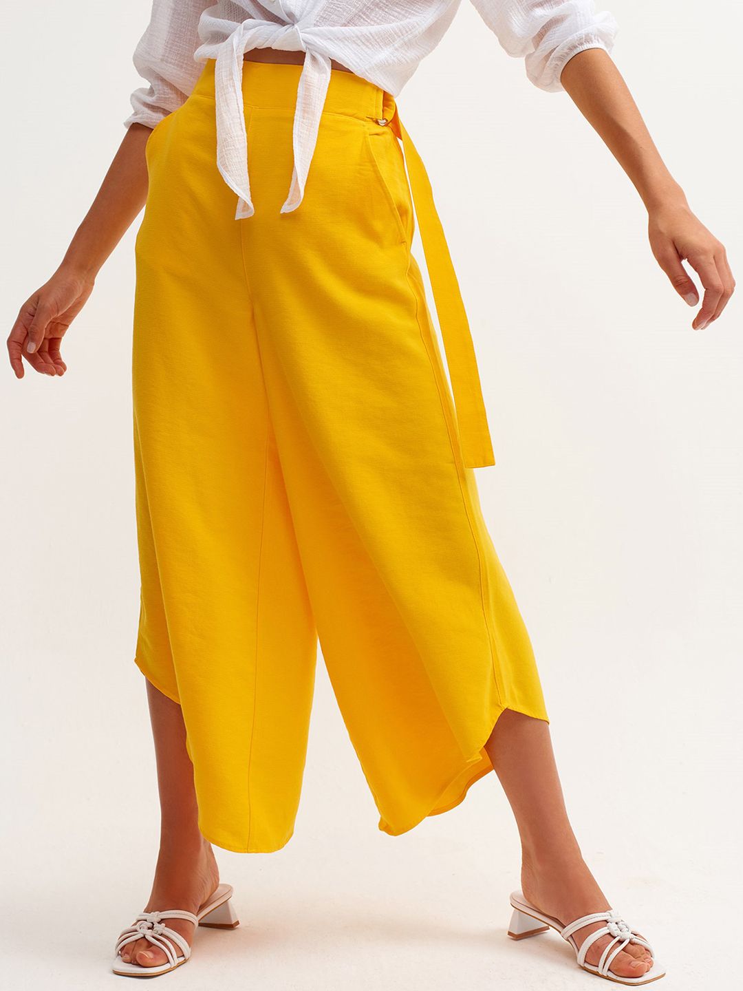 OXXO Women Yellow Solid Flared High-Rise Trousers Price in India