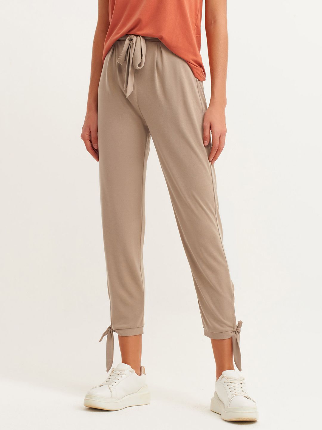 OXXO Women Taupe Solid Trousers Price in India