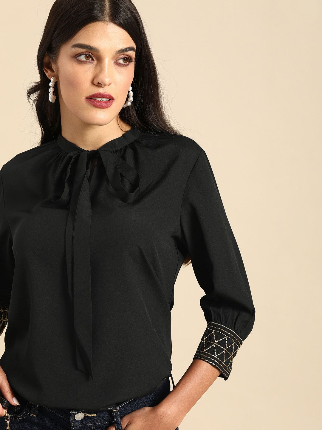 all about you Women Black Solid Tie-Up Neck Regular Top Price in India