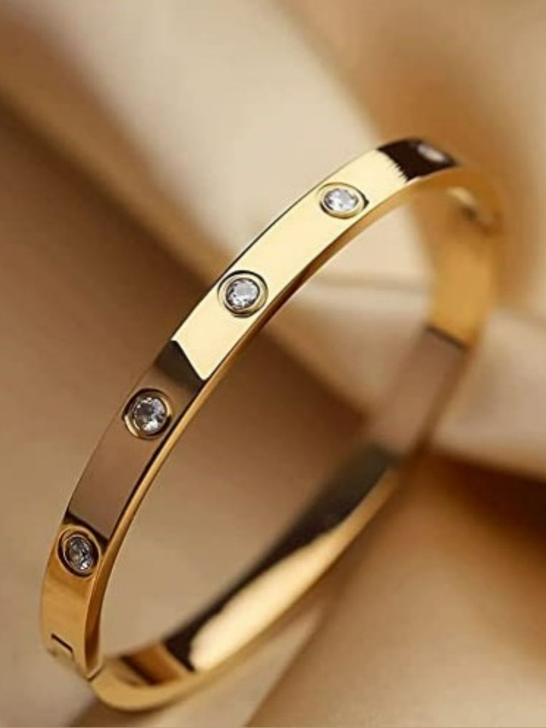EL REGALO Women Gold-Toned White Kada Bangle Bracelet Price in India