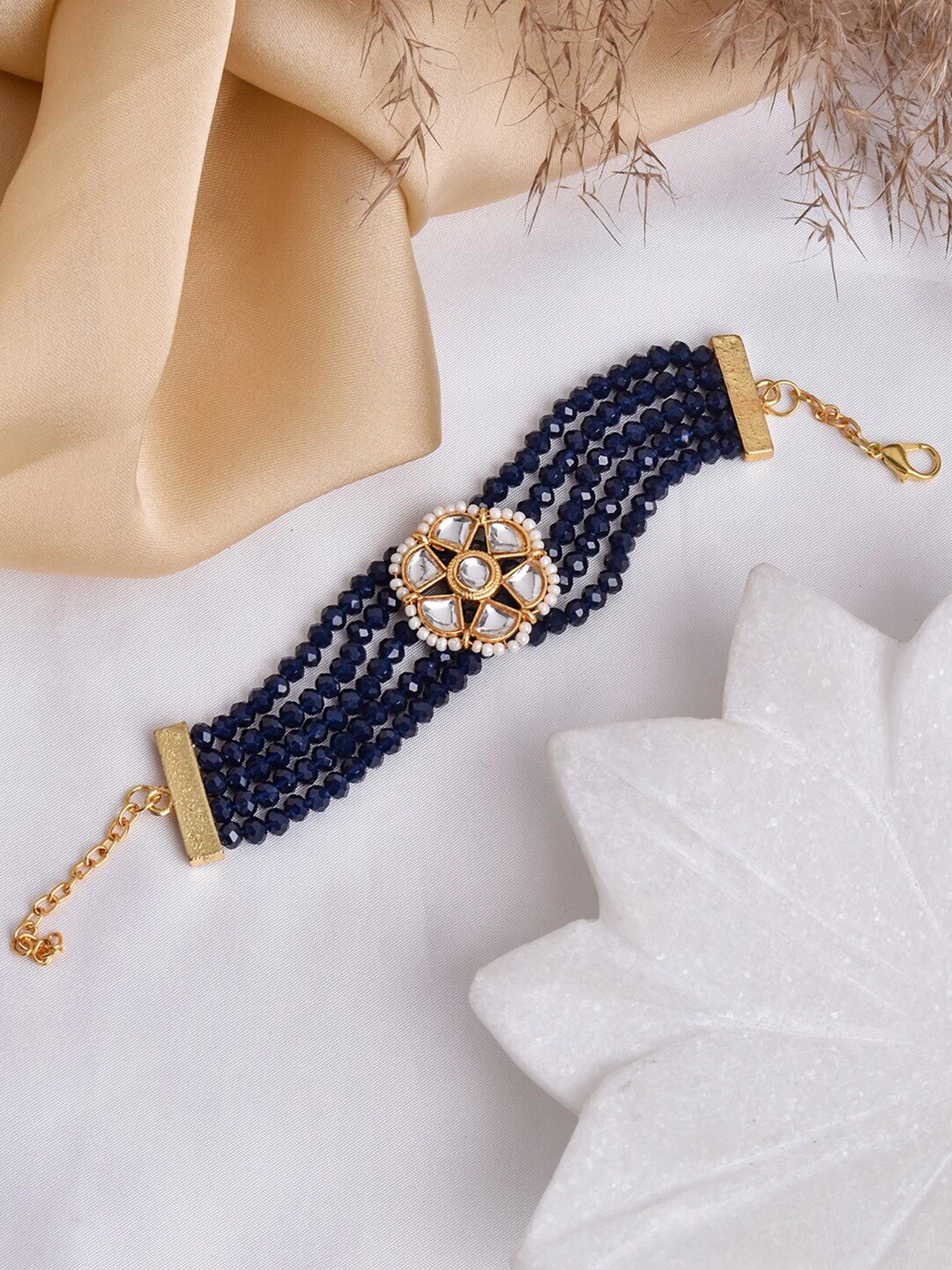 TEEJH Women Gold-Toned & Navy Blue Brass Multistrand Bracelet Price in India