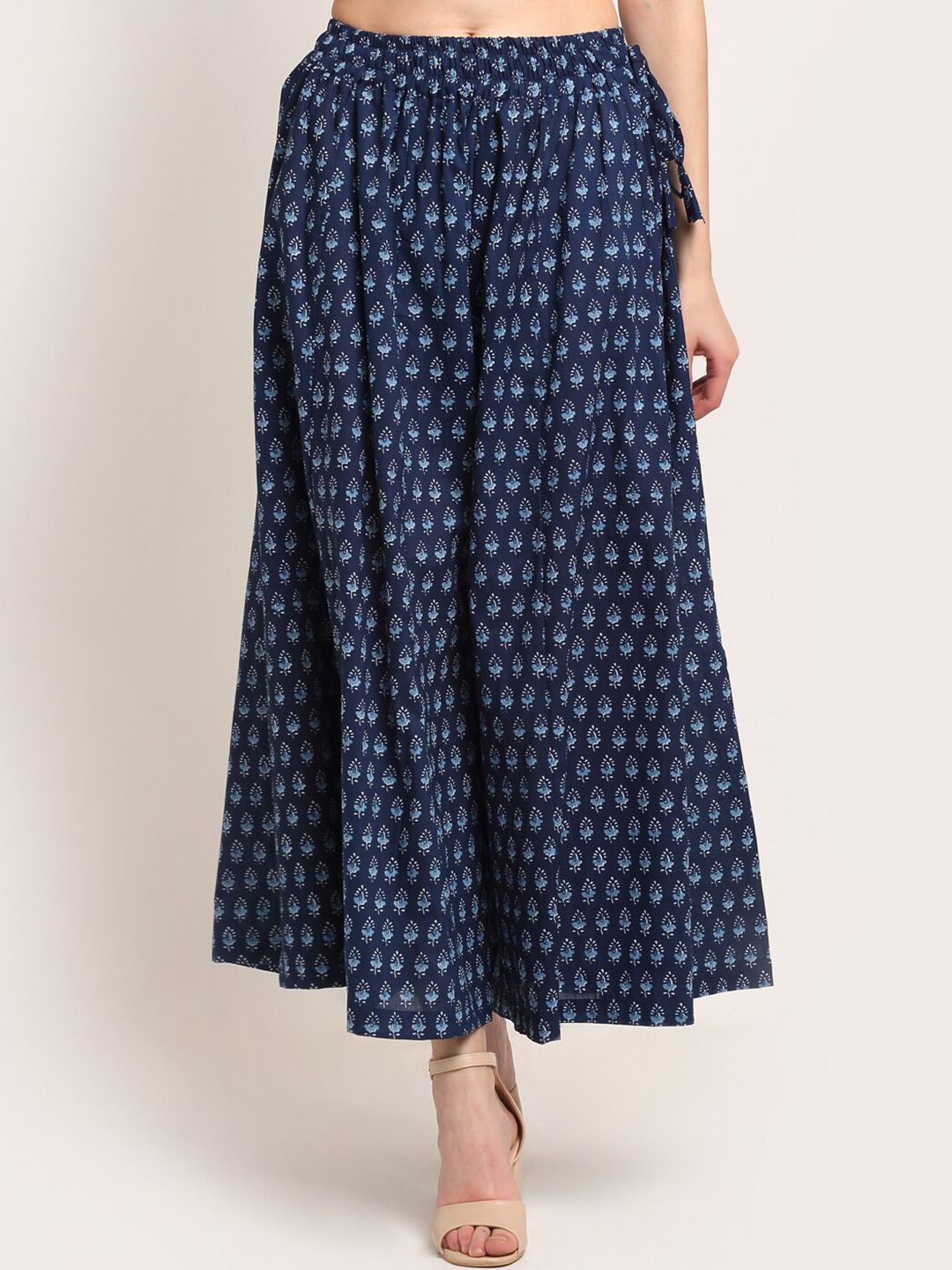 TAG 7 Women Navy Blue Printed Flared Palazzos Price in India