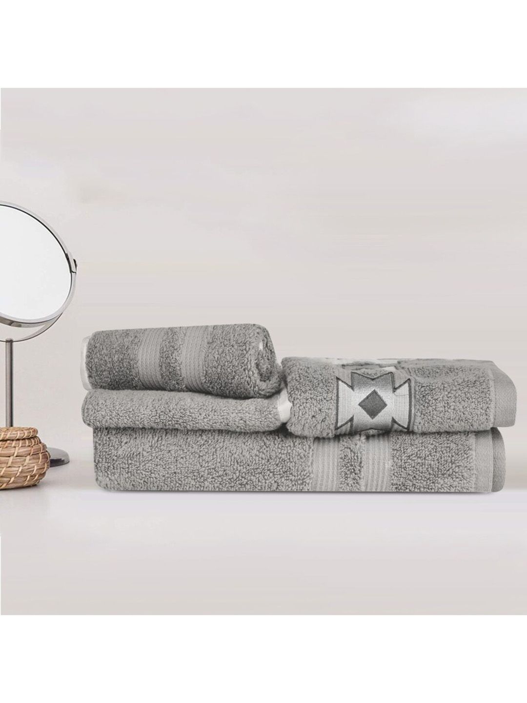 LUSH & BEYOND Set Of 4 Grey Solid Pure Cotton Towels Price in India