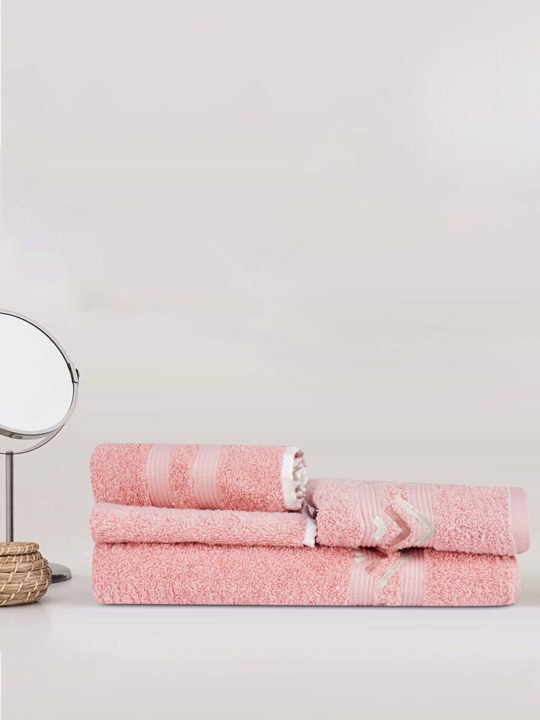 LUSH & BEYOND Set Of 4 Peach Solid 500 GSM Pure Cotton Bath Towels Price in India
