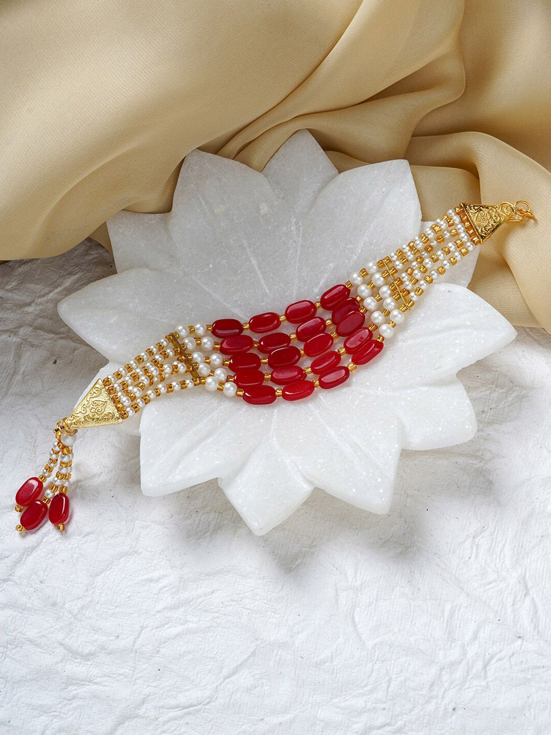TEEJH Women Gold-Plated White & Red Brass Pearl Beaded Layered Wraparound Bracelet Price in India