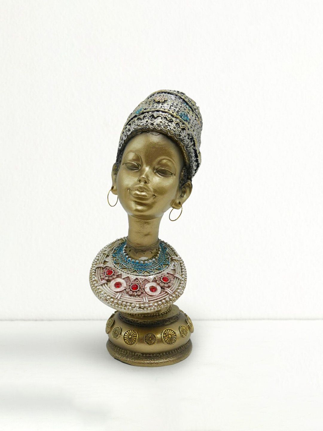 Home Centre Gold-Tone Engraved African Figurine Showpieces Price in India