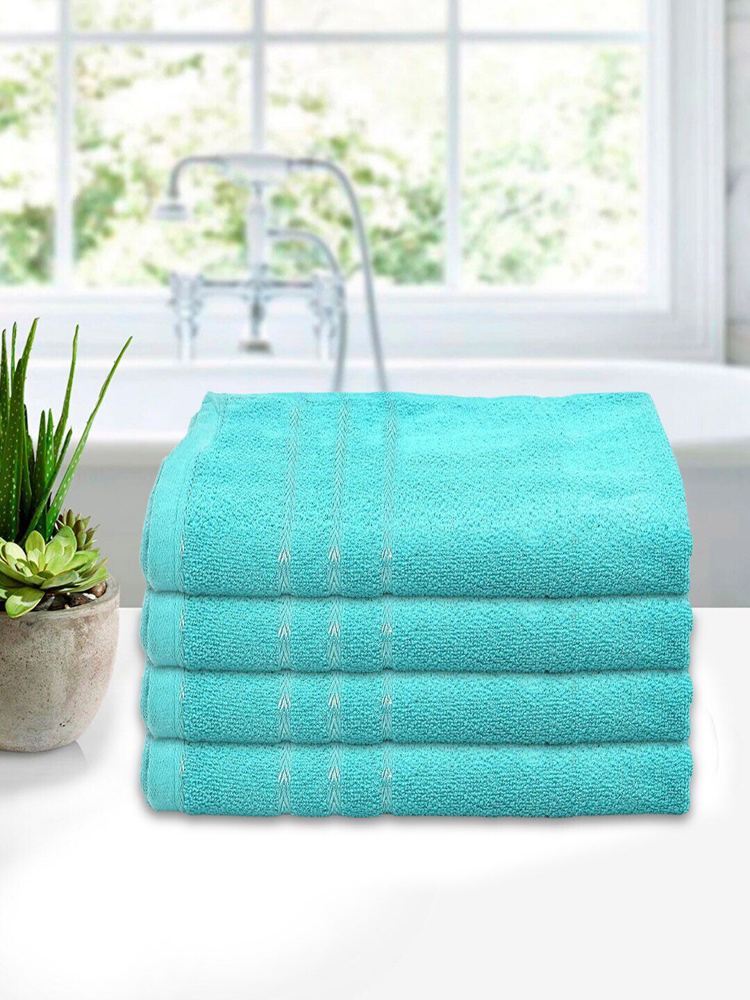 Kuber Industries Pack Of 4 Blue Solid 210GSM Bath Towel Price in India