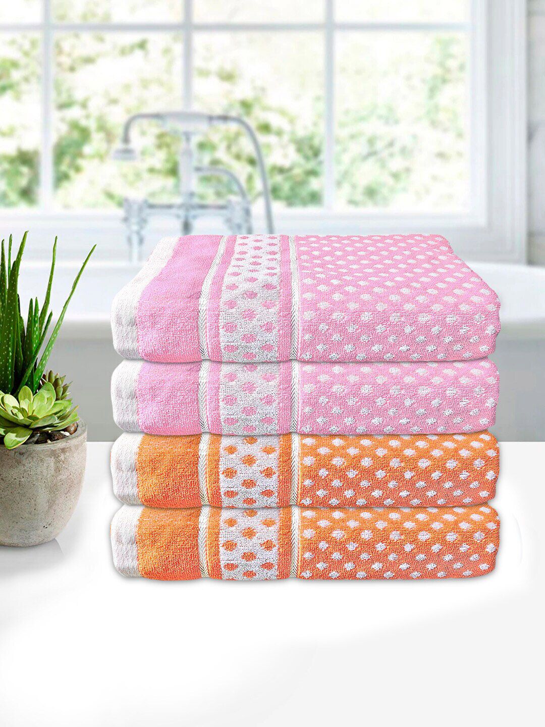 Kuber Industries Pack of 4 Pink & Orange Printed Cotton Bath Towels Price in India