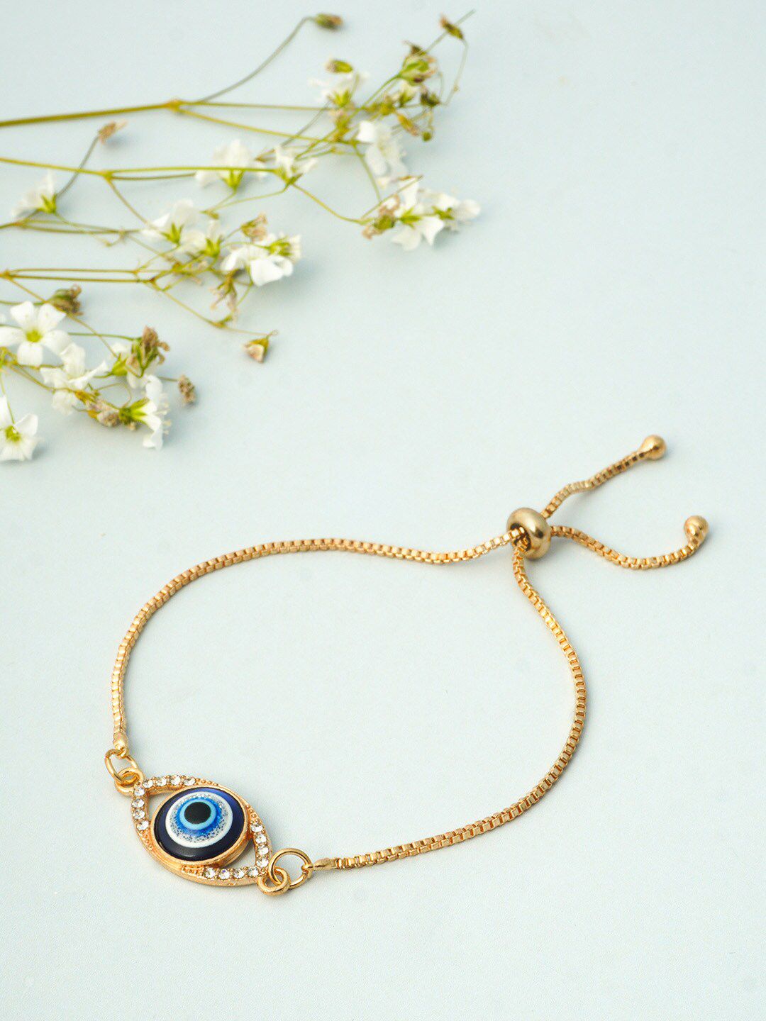 Ferosh Women Gold-Toned & Blue Evil Eye Chain Charm Bracelet Price in India