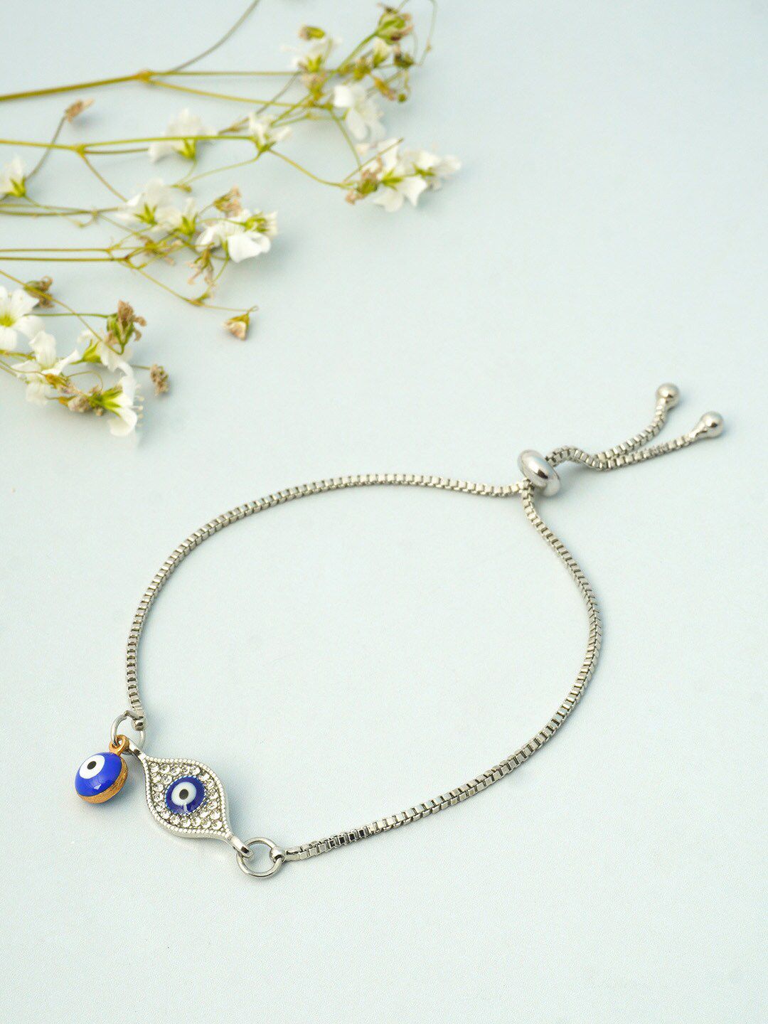 Ferosh Women Silver-Toned & Blue Evil Eye Charm Bracelet Price in India