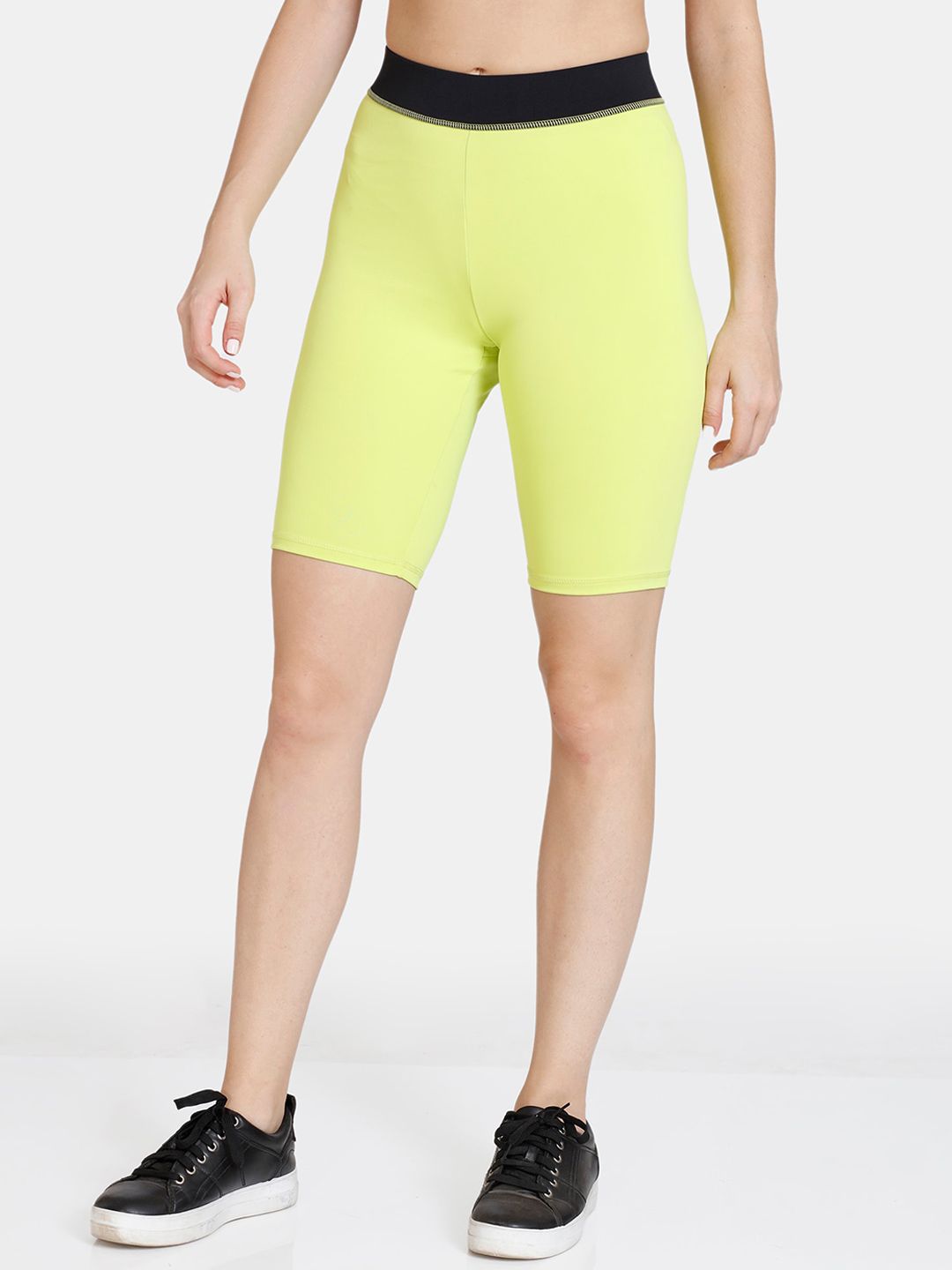 Zelocity by Zivame Women Yellow Solid Sports Shorts Price in India