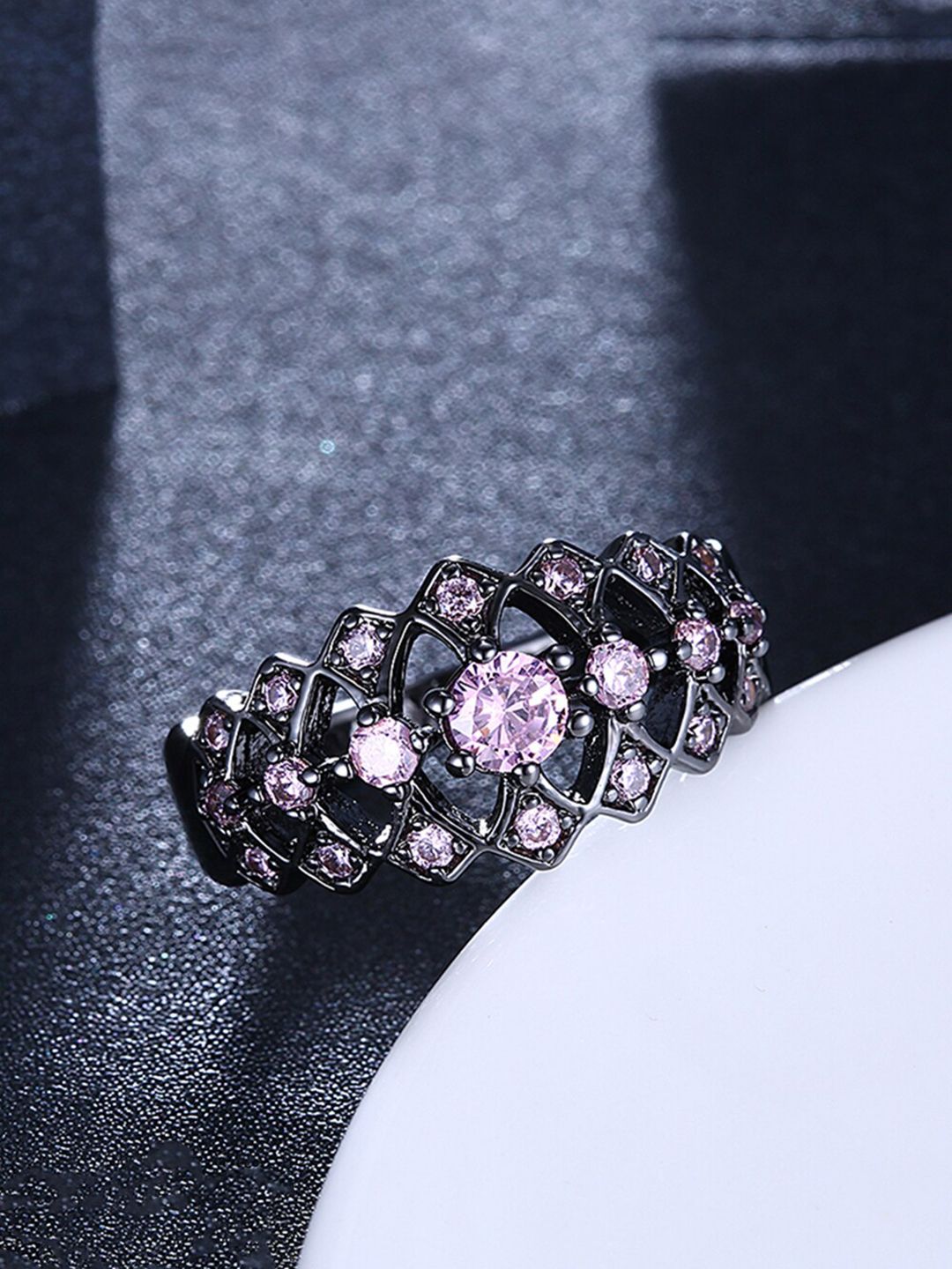 Yellow Chimes Black-Gun Plated Pink Crystal Stone Studded Finger Ring Price in India